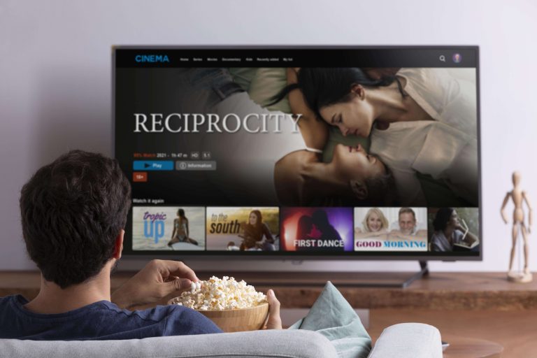 man-watching-streaming-service-his-tv-min-1-768x512